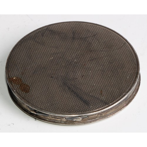 1126 - An Art Deco silver and guilloche enamel circular compact, hinged cover decorated with geometric moti... 