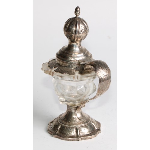 883 - A Dutch silver and clear glass mustard, hinged cover, scroll handle, the mounts engraved with scroll... 