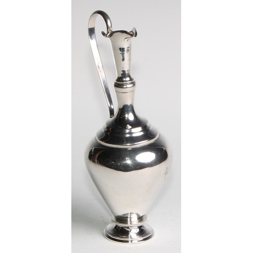 1048 - A Russian silver ewer, engraved in the Aesthetic Movement taste with birds and flowering branches, l... 