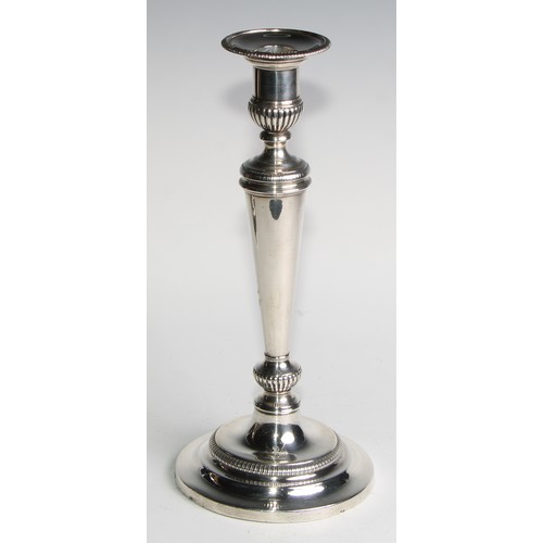 1223 - Matthew Boulton - a pair of George III silver table candlesticks, half-fluted campana sconces with d... 