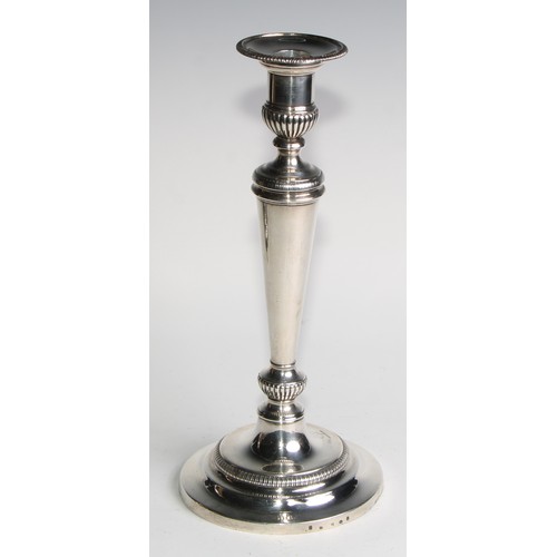 1223 - Matthew Boulton - a pair of George III silver table candlesticks, half-fluted campana sconces with d... 