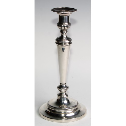 1223 - Matthew Boulton - a pair of George III silver table candlesticks, half-fluted campana sconces with d... 