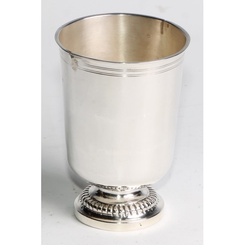 888 - A French silver pedestal beaker, quite plain, slightly flared rim, domed fluted foot, 10.5cm high, 1... 