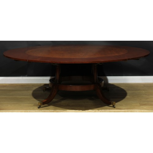 2368 - A Regency Revival mahogany extending dining table, in the manner of Johnstone, Jupe & Co and William... 