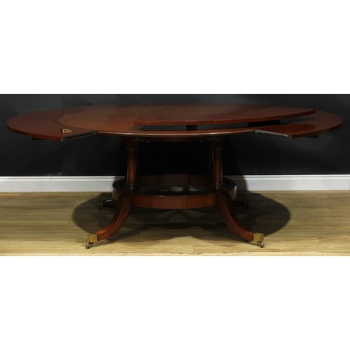 2368 - A Regency Revival mahogany extending dining table, in the manner of Johnstone, Jupe & Co and William... 