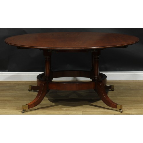 2368 - A Regency Revival mahogany extending dining table, in the manner of Johnstone, Jupe & Co and William... 