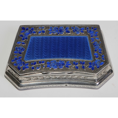 1145 - An early 20th century French silver and enamel lozenge shaped snuff box, hinged cover with blue guil... 