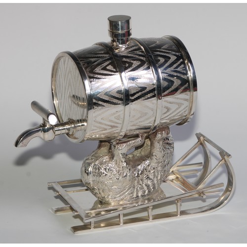 829 - A silver plated novelty spirit barrel, amusingly modelled as a bear reclining on a sledge, 22cm long