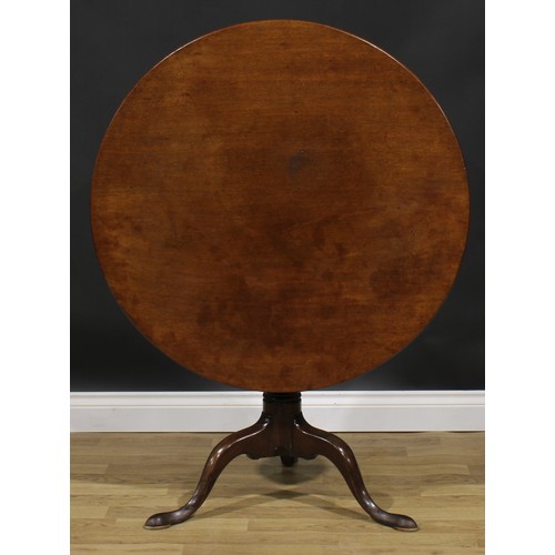 1707 - A 19th century mahogany tripod occasional table, one-piece circular tilting top, turned column, cabr... 