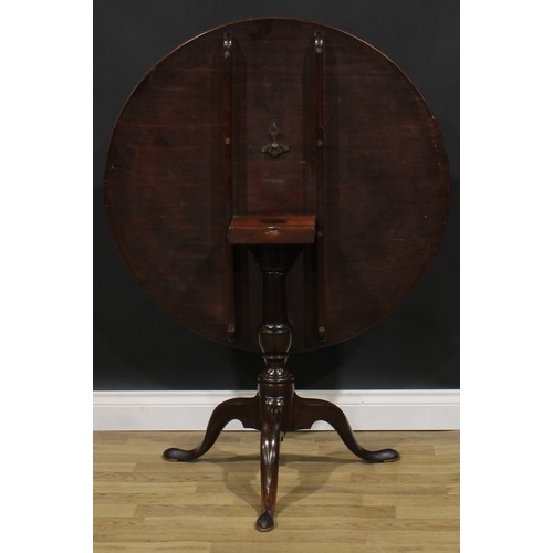 1707 - A 19th century mahogany tripod occasional table, one-piece circular tilting top, turned column, cabr... 