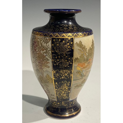 473 - A pair of Japanese satsuma baluster vases, decorated with traditional landscape and bird panels, blu... 