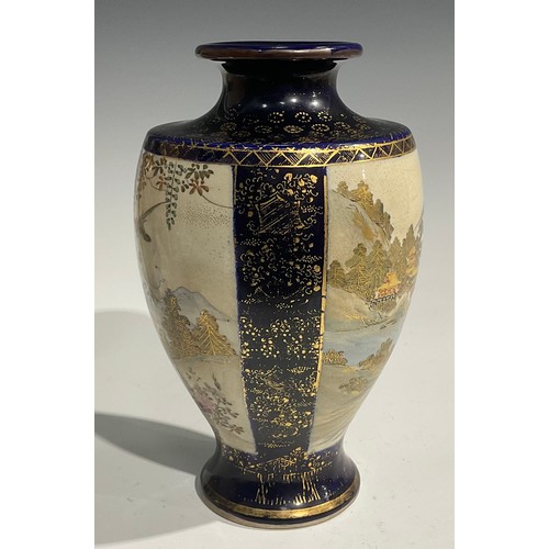 473 - A pair of Japanese satsuma baluster vases, decorated with traditional landscape and bird panels, blu... 