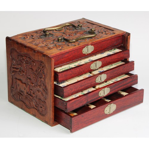 383 - A Chinese mahjong set, comprising bone and bamboo tiles and an arrangement of bone counters, the box... 