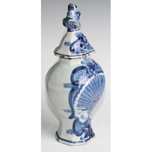 290 - A Delftware five piece garniture, boldly decorated in underglaze blue, the largest 36cm high (5)