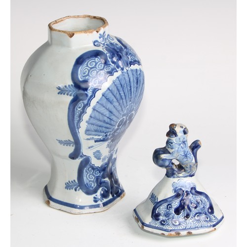 290 - A Delftware five piece garniture, boldly decorated in underglaze blue, the largest 36cm high (5)