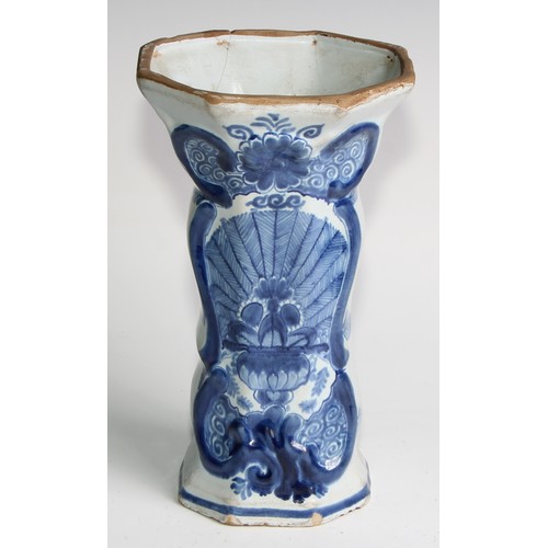 290 - A Delftware five piece garniture, boldly decorated in underglaze blue, the largest 36cm high (5)