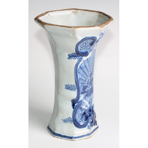 290 - A Delftware five piece garniture, boldly decorated in underglaze blue, the largest 36cm high (5)