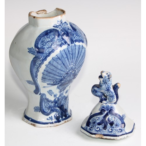 290 - A Delftware five piece garniture, boldly decorated in underglaze blue, the largest 36cm high (5)