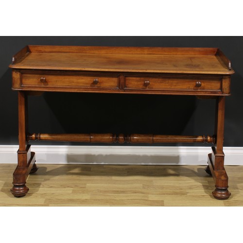 2309 - A William IV mahogany washstand, rectangular top with three-quarter gallery above a pair of frieze d... 