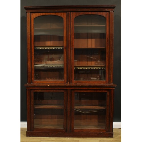 2600 - A Victorian rosewood library bookcase, moulded cornice above a pair of glazed doors enclosing adjust... 