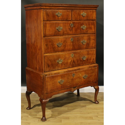 2107 - A George II Revival walnut chest on stand, moulded cornice above two short and three long graduated ... 