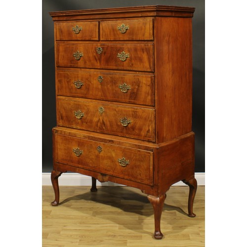 2107 - A George II Revival walnut chest on stand, moulded cornice above two short and three long graduated ... 