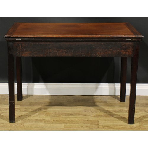 1797 - A George III mahogany double-rise architect’s table, rectangular top height and angle adjustable on ... 