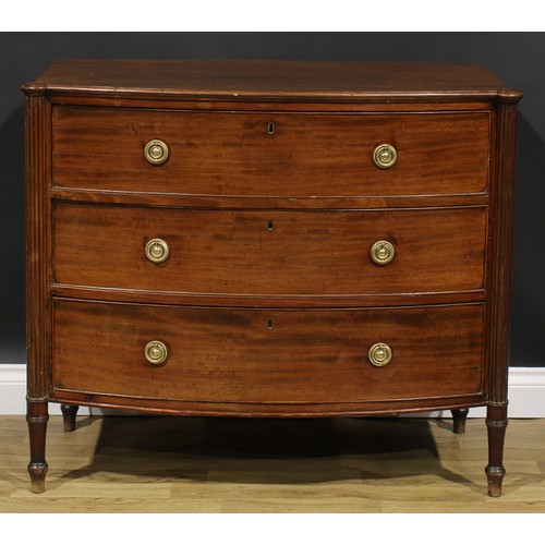 2357 - A Regency mahogany bowfront chest, slightly oversailing top above three long graduated cockbeaded dr... 