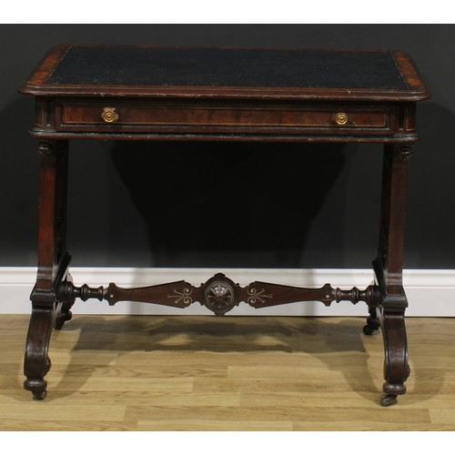 1843 - A late Victorian Aesthetic Movement walnut and mahogany writing table, rounded rectangular top above... 