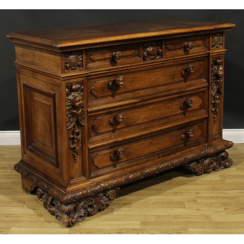 2398 - An Italian Renaissance Revival commode, rectangular top with moulded edge above four long drawers, s... 