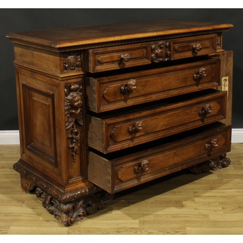 2398 - An Italian Renaissance Revival commode, rectangular top with moulded edge above four long drawers, s... 