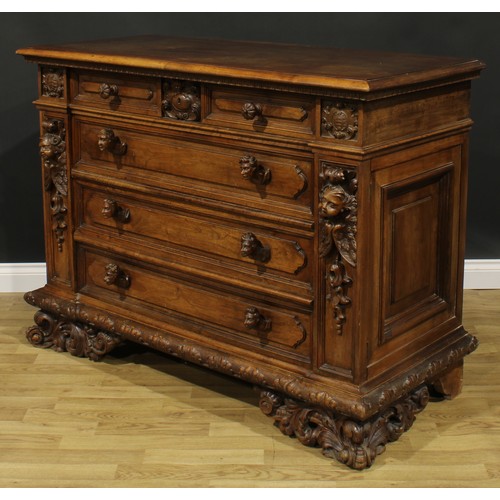 2398 - An Italian Renaissance Revival commode, rectangular top with moulded edge above four long drawers, s... 