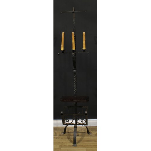 1906 - Interior Design - an 18th century style wrought iron tripod floor lamp, 186.5cm high overall