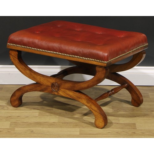 2541 - A pair of William IV style mahogany X-frame stools, stuffed-over seats with studded borders, 42cm hi... 