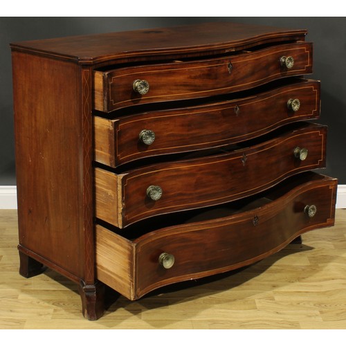 2462 - A George III mahogany serpentine chest, slightly oversailing top above four long graduated drawers, ... 