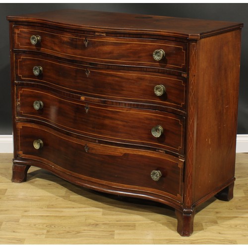 2462 - A George III mahogany serpentine chest, slightly oversailing top above four long graduated drawers, ... 