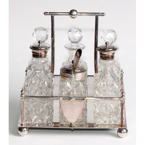 817 - A late Victorian E.P.N.S rectangular six-bottle cruet, in the Christopher Dresser taste, ball feet, ... 