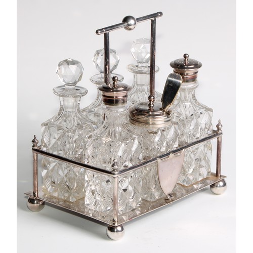 817 - A late Victorian E.P.N.S rectangular six-bottle cruet, in the Christopher Dresser taste, ball feet, ... 