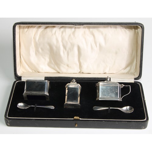 1127 - An Art Deco silver canted rectangular three piece condiment set, comprising sat, pepper and mustard,... 