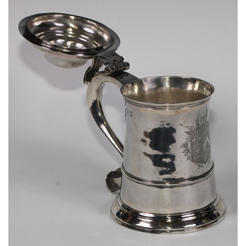 906 - A George II silver tankard, hinged domed cover with scroll  thumbpiece, three-quarter girdle, scroll... 