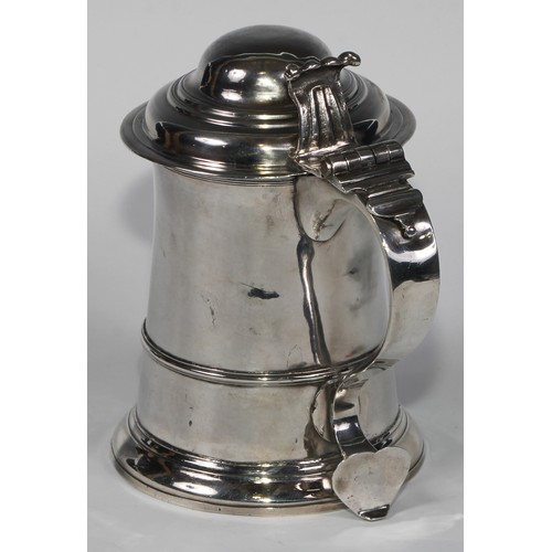 906 - A George II silver tankard, hinged domed cover with scroll  thumbpiece, three-quarter girdle, scroll... 