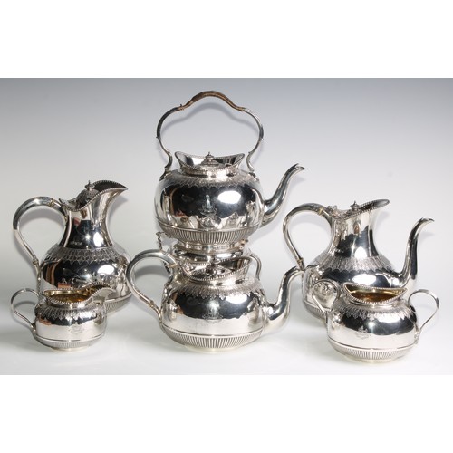 1004 - A late Victorian/Edwardian silver six piece Cape pattern tea and coffee service, comprising teapot, ... 