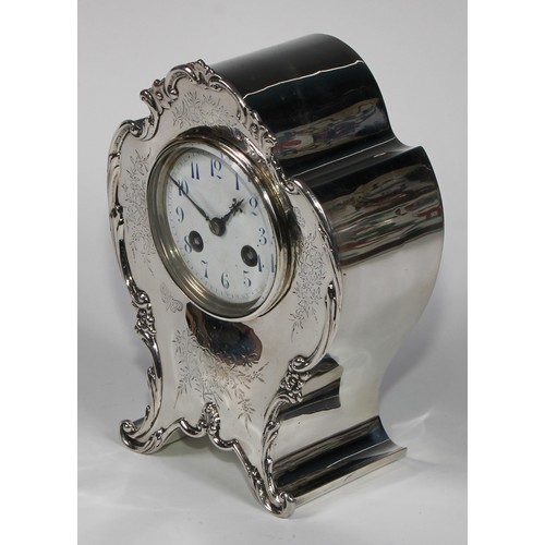 1161 - An Edwardian silver cartouche shaped mantel clock, 7.5cm circular enamel dial inscribed with Arabic ... 