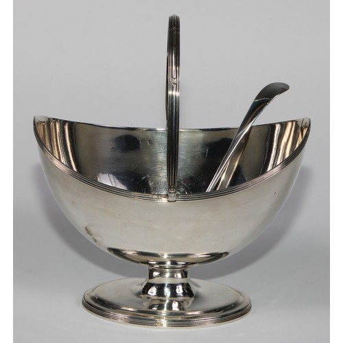 916 - A George III silver boat shaped pedestal sugar basket, reeded borders and swing handle, navette shap... 