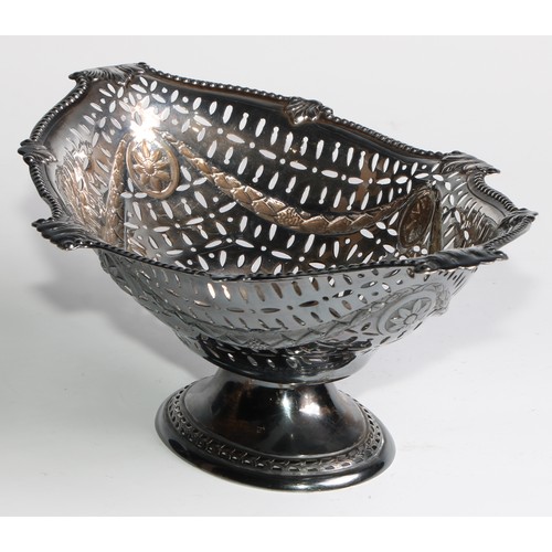 1078 - A Victorian Adam Revival silver boat shaped pedestal cake dish, pierced and embossed with swags and ... 