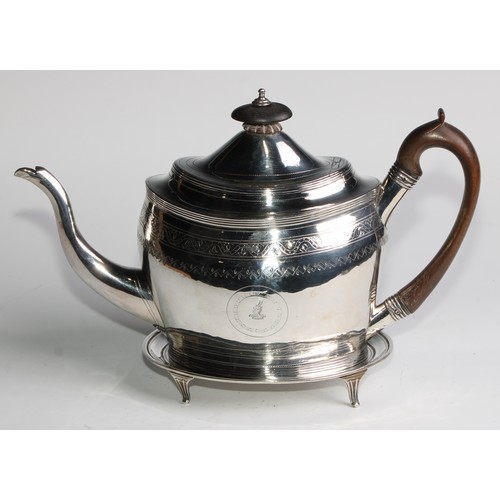 935 - A George III silver oval teapot and stand, bright-cut and wriggle-work engraved throughout, hinged d... 