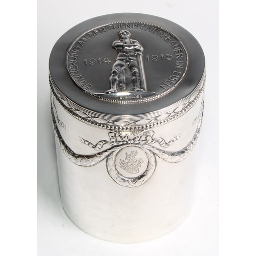 1146 - An early 20th century German silver cylindrical box or caddy, hinged cover embossed with a memorial,... 