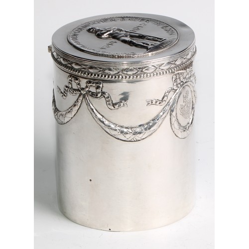 1146 - An early 20th century German silver cylindrical box or caddy, hinged cover embossed with a memorial,... 