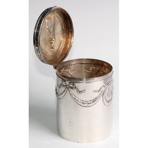 1146 - An early 20th century German silver cylindrical box or caddy, hinged cover embossed with a memorial,... 