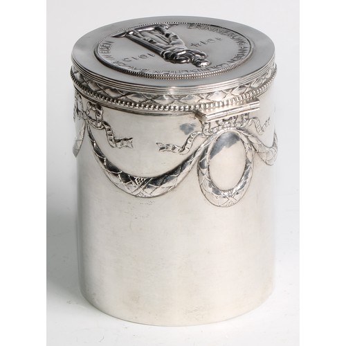 1146 - An early 20th century German silver cylindrical box or caddy, hinged cover embossed with a memorial,... 